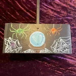 Hand painted glass milk jar carrier.